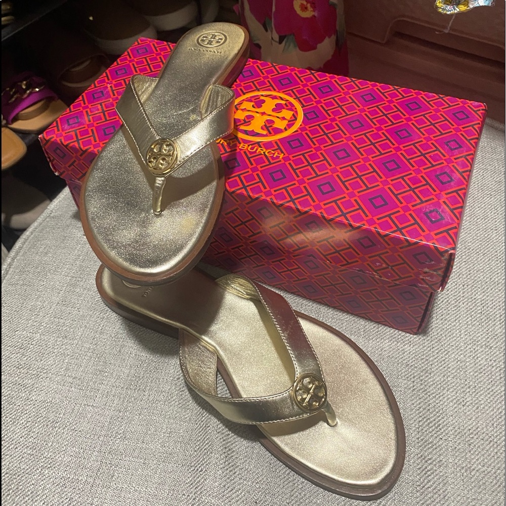 Gold Tory Burch flip flops